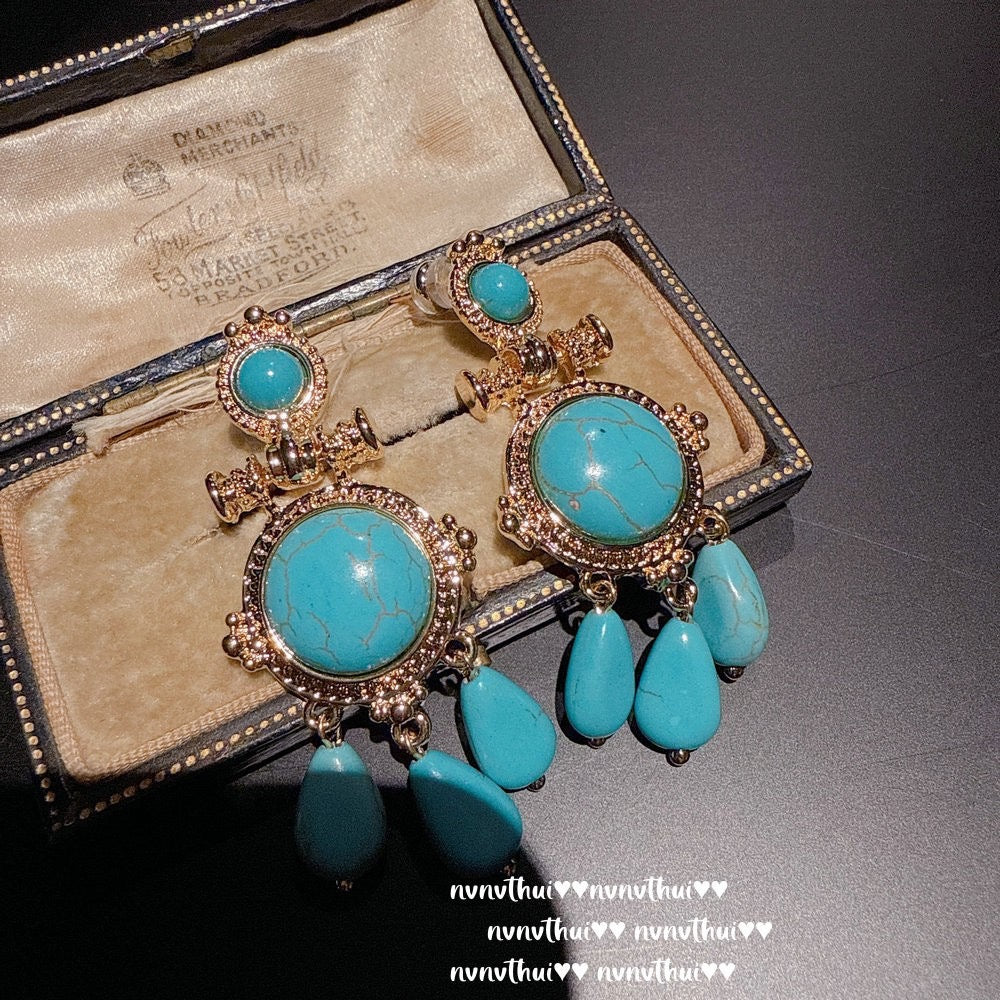 Italian vintage relief petal greenstone teardrop earrings, Sotheby's, royal teardrop bluestone earrings