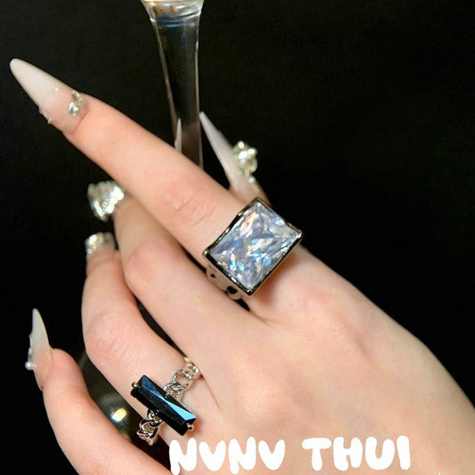 Black lustrous piano-shaped ring, Goddess of Moonlight, Deep Sea Blue egg-shaped ring