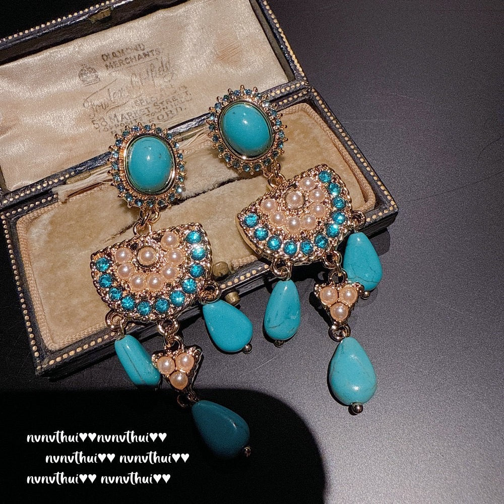 Italian vintage relief petal greenstone teardrop earrings, Sotheby's, royal teardrop bluestone earrings