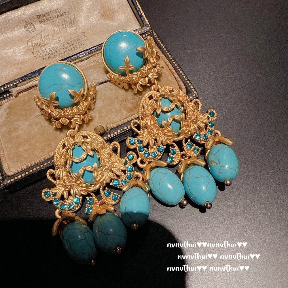 Italian vintage relief petal greenstone teardrop earrings, Sotheby's, royal teardrop bluestone earrings