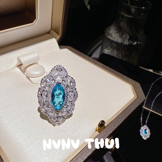 18k Gold wire inlaid with colored enamel, horse-eye gemstone, sugar-sized zirconium crystal