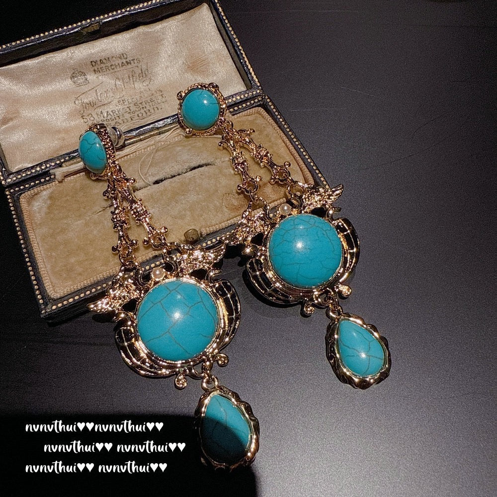 Italian vintage relief petal greenstone teardrop earrings, Sotheby's, royal teardrop bluestone earrings