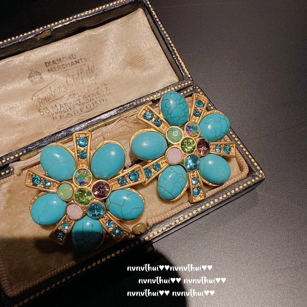 Italian vintage relief petal greenstone teardrop earrings, Sotheby's, royal teardrop bluestone earrings